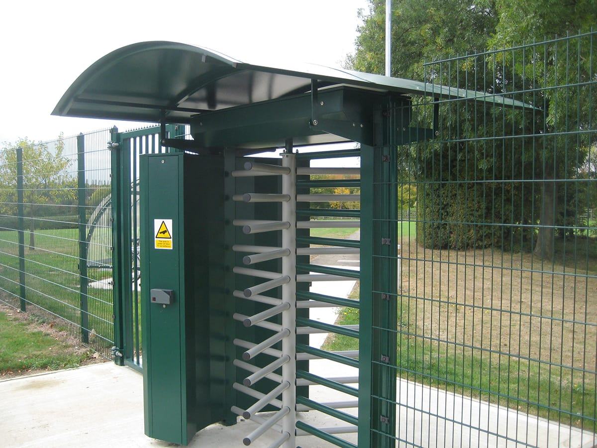 Full height turnstile with mesh fencing