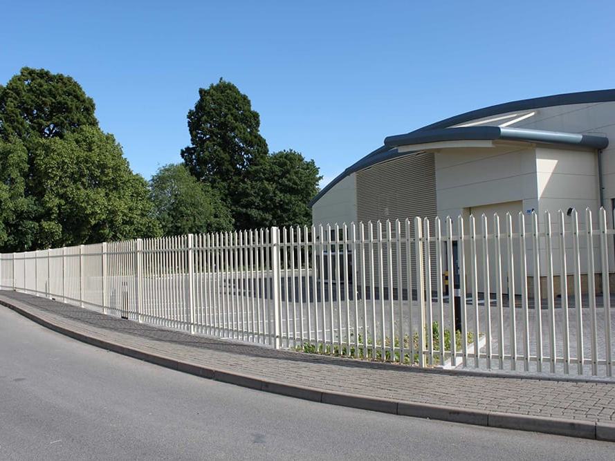Palisade fencing to a commercial building