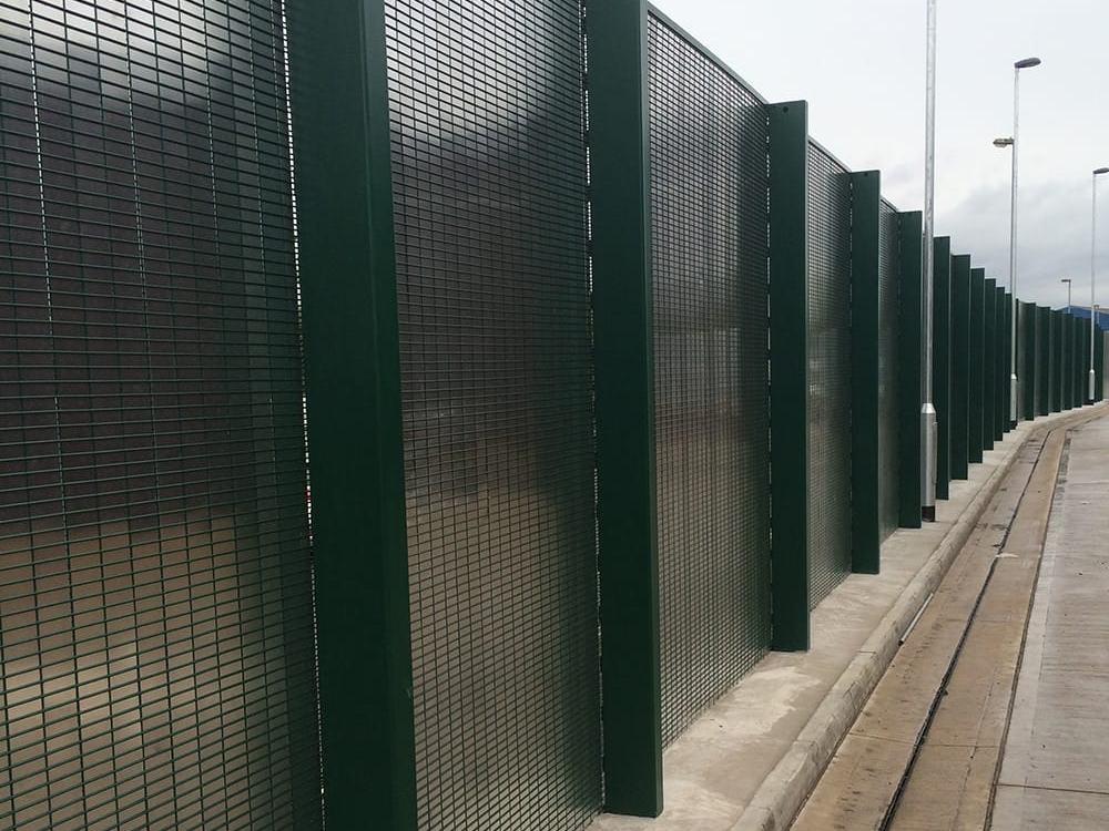 Timber acoustic fencing to a highway