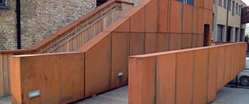 Bespoke commercial fencing solution with wooden fencing and railings made to measure for commercial fencing page