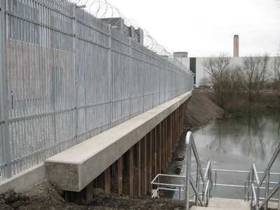 Security commercial palisade fencing with barbed wire topping