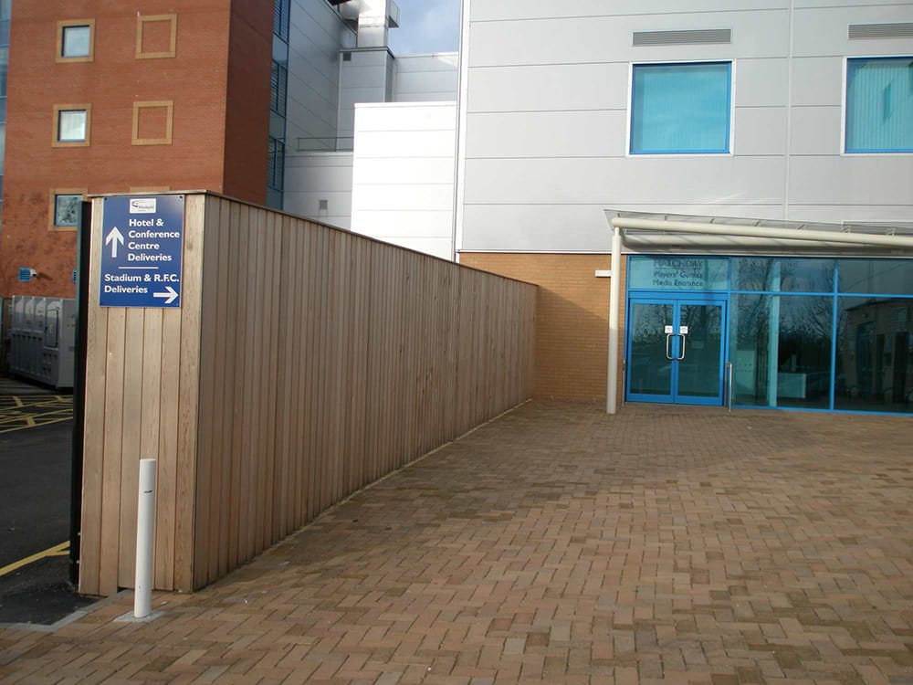 timber fencing outside of hotel